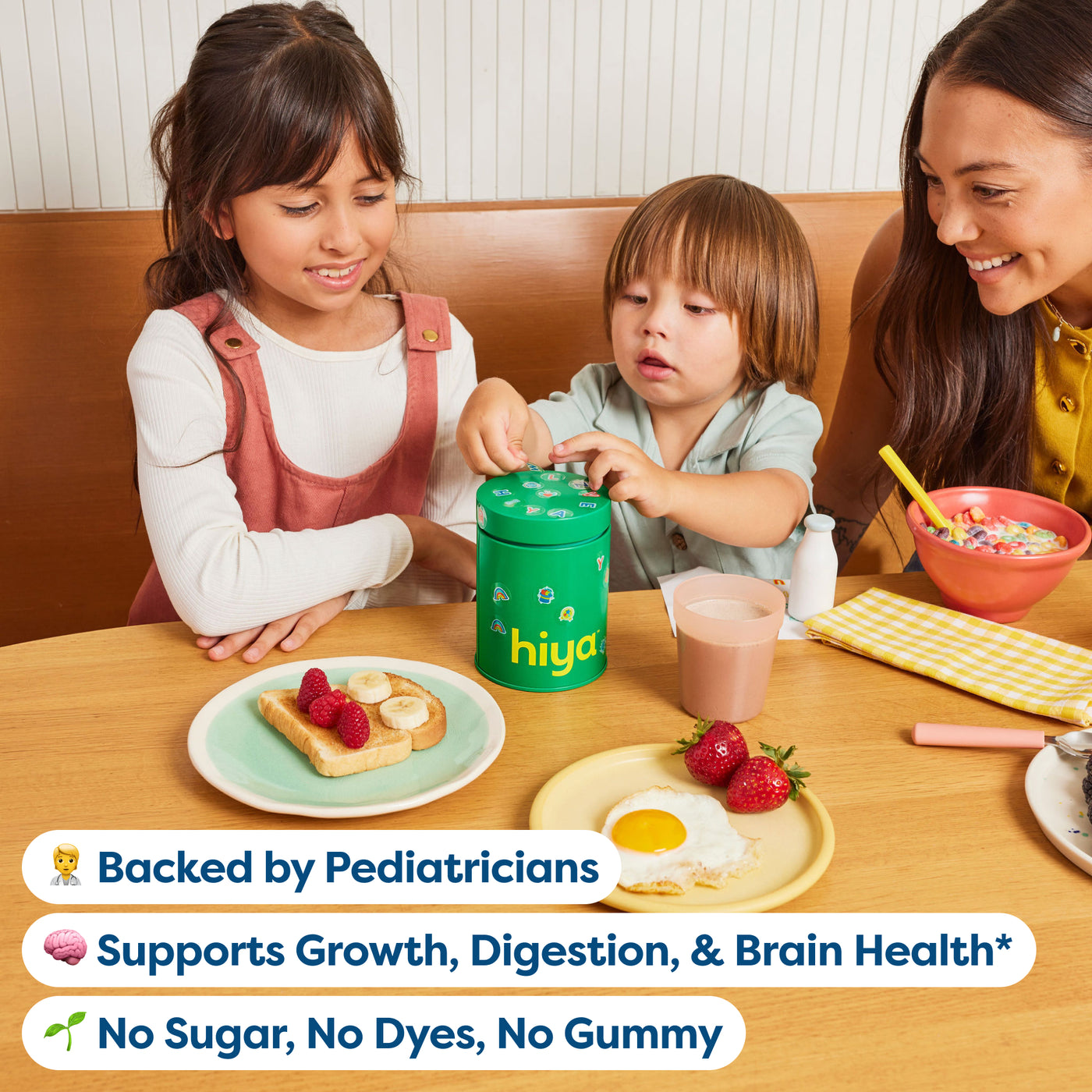 Family at breakfast with a Hiya Greens canister and official product benefit callouts